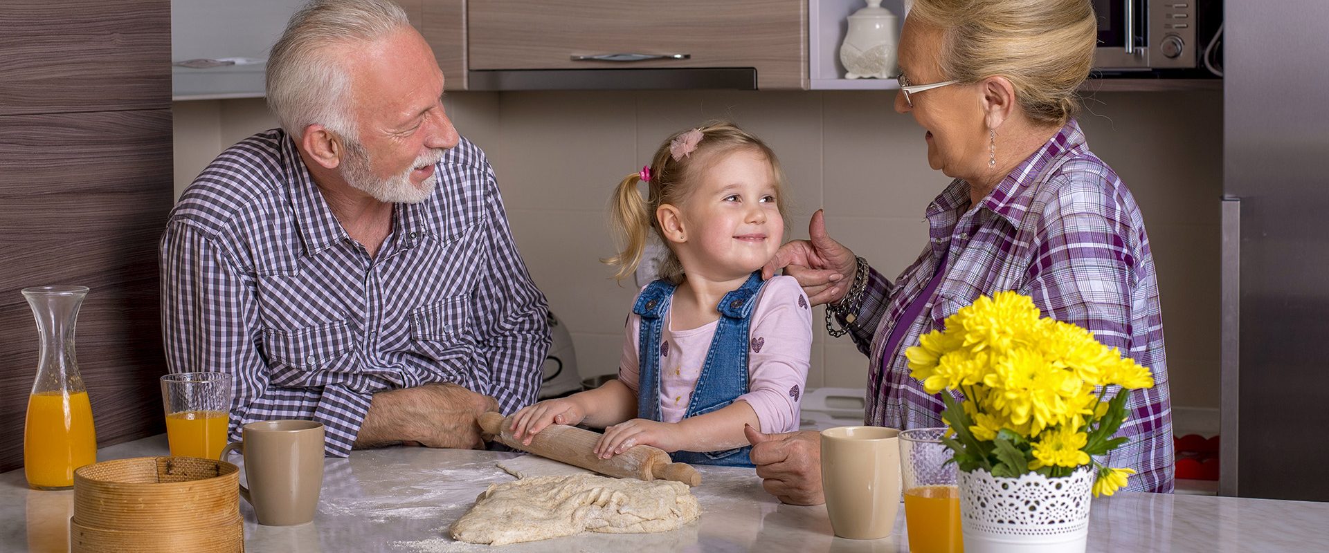 adorable-little-girl-cooking-with-her-grandparents