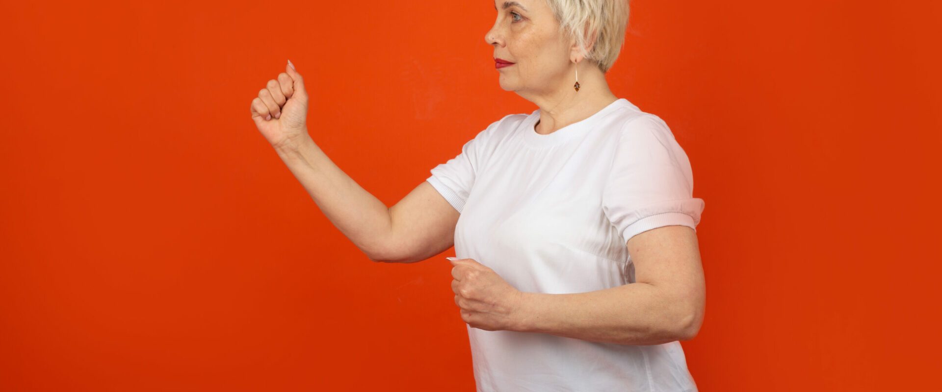 adult-female-aged-karate-pose