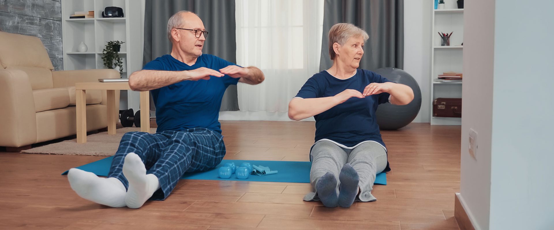 cheerful-senior-couple-training-together-sitting-yoga-mat-old-person-healthy-active-lifestyle-exercise-workout-home-elderly-training-fitness