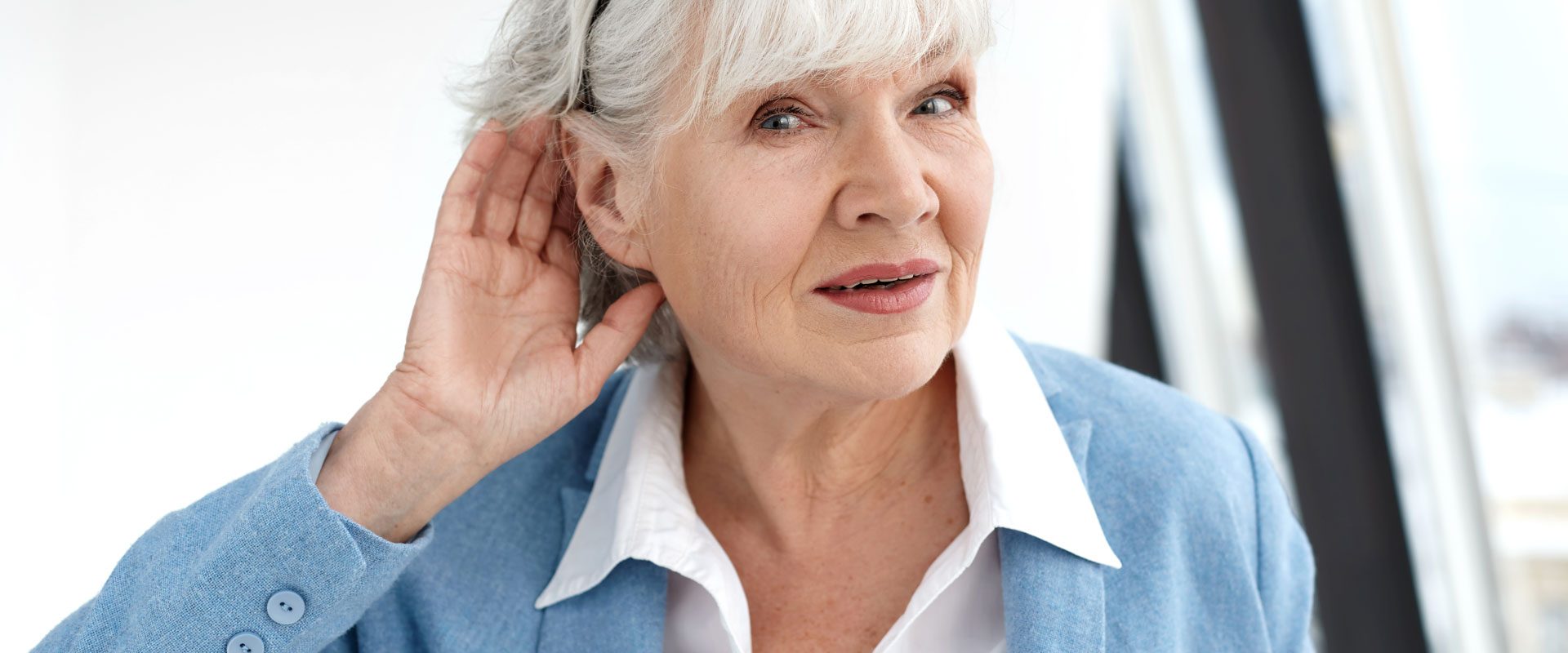 close-up-elegant-stylish-elderly-woman-formal-suit-having-hearing-problems-holding-hand-her-ear-trying-hear-you-saying-speak-louder-please-age-maturity-people-health-concept