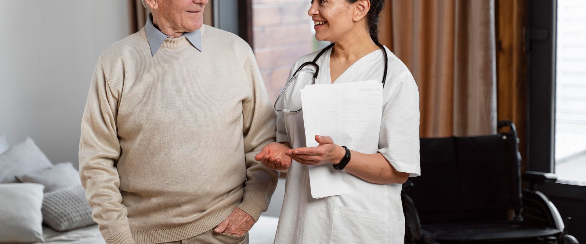 doctor-talking-her-senior-patient