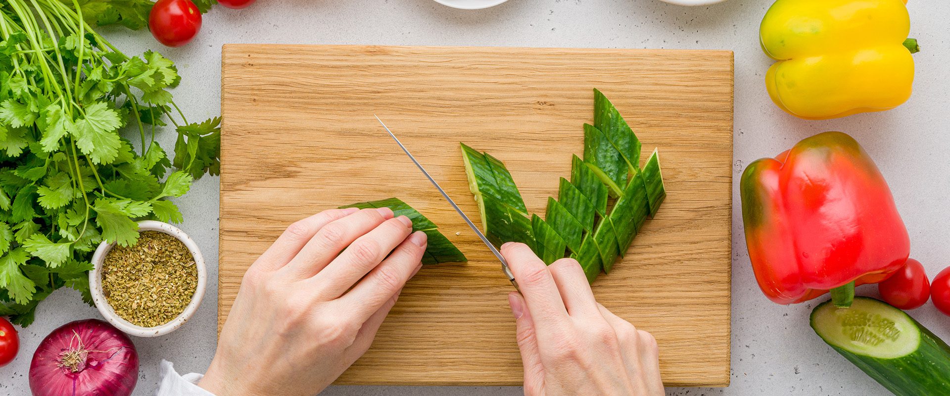 faceless-female-cutting-ingredients-greek-village-horiatiki-salad-food-background-flat-lay