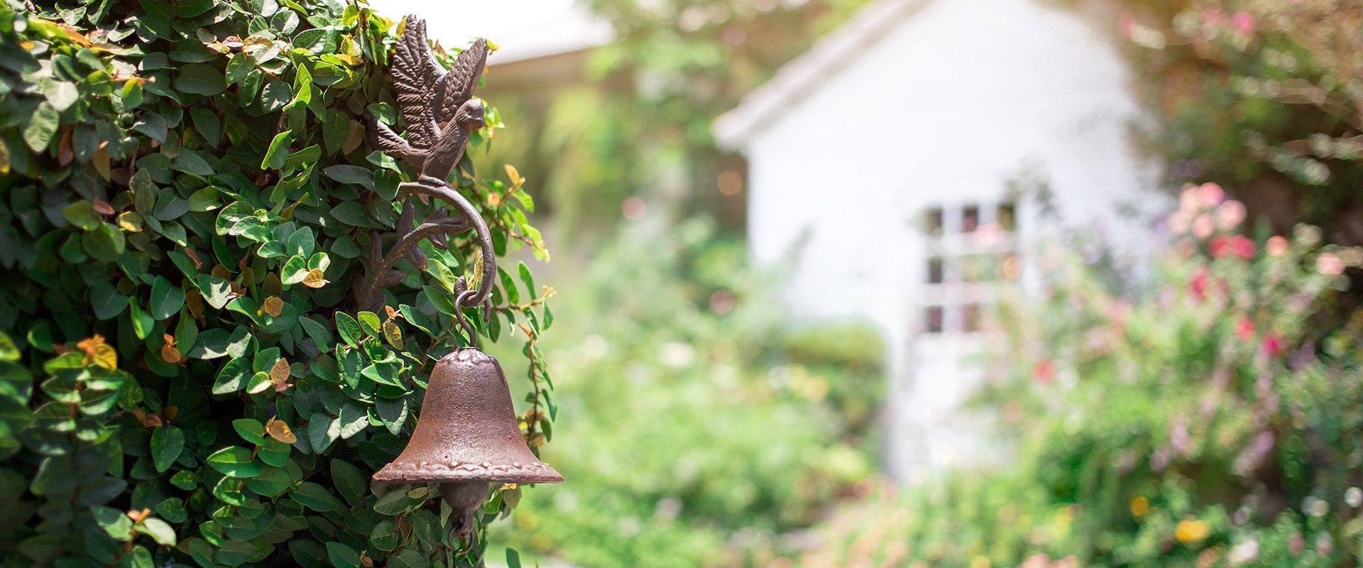vintage-copper-bell-decoration-plant-wall-gate-vintage-house-with-garden